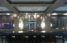 Lobby table area showing unique globe lights